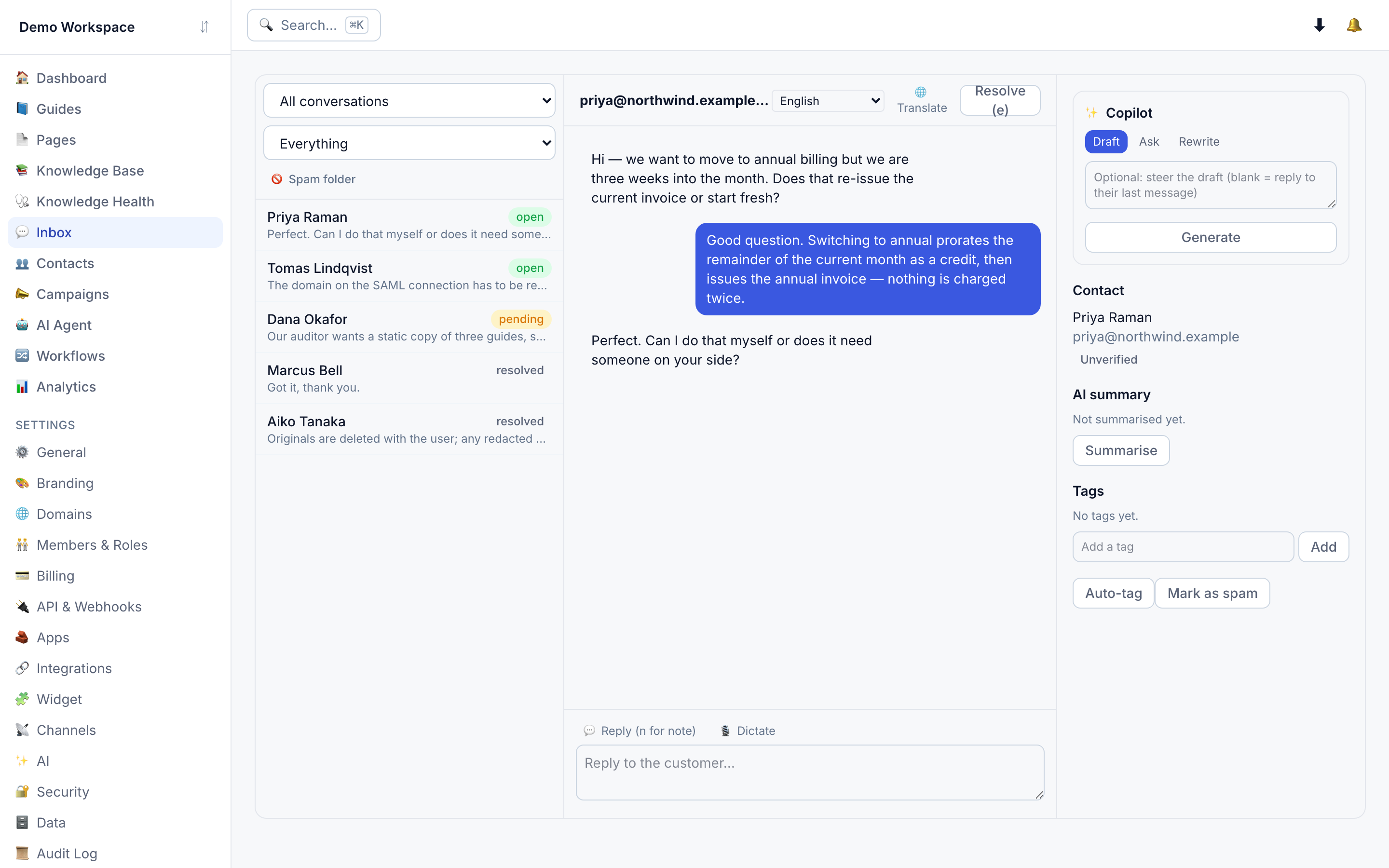 The inbox: conversation list, thread, and the copilot pane citing two guides